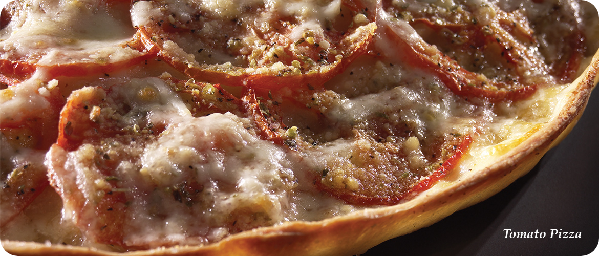 Close-up of a tomato pizza topped with slices of tomato, melted cheese, and a sprinkle of spices. Text in the bottom right corner reads "Tomato Pizza.