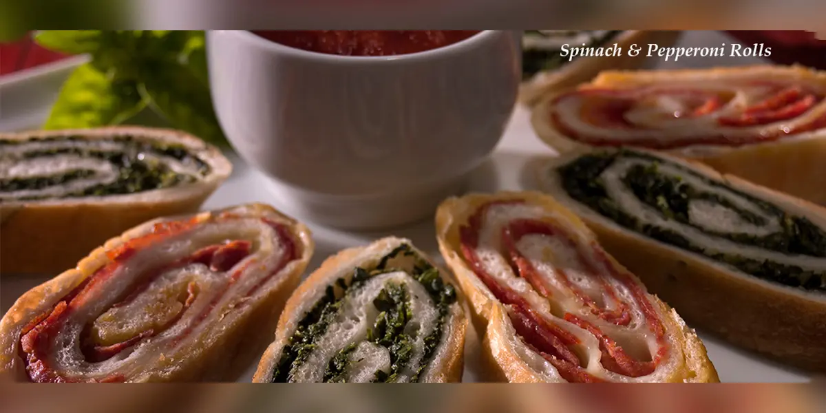 A plate of food with some different types of sandwiches.