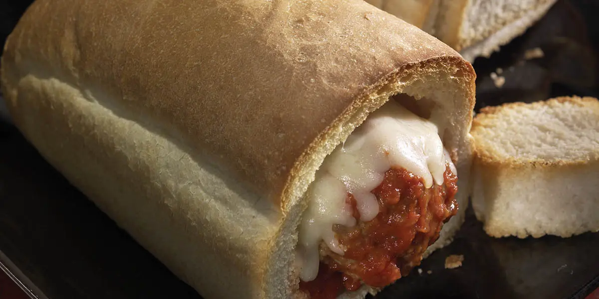 A close up of a meatball sub sandwich