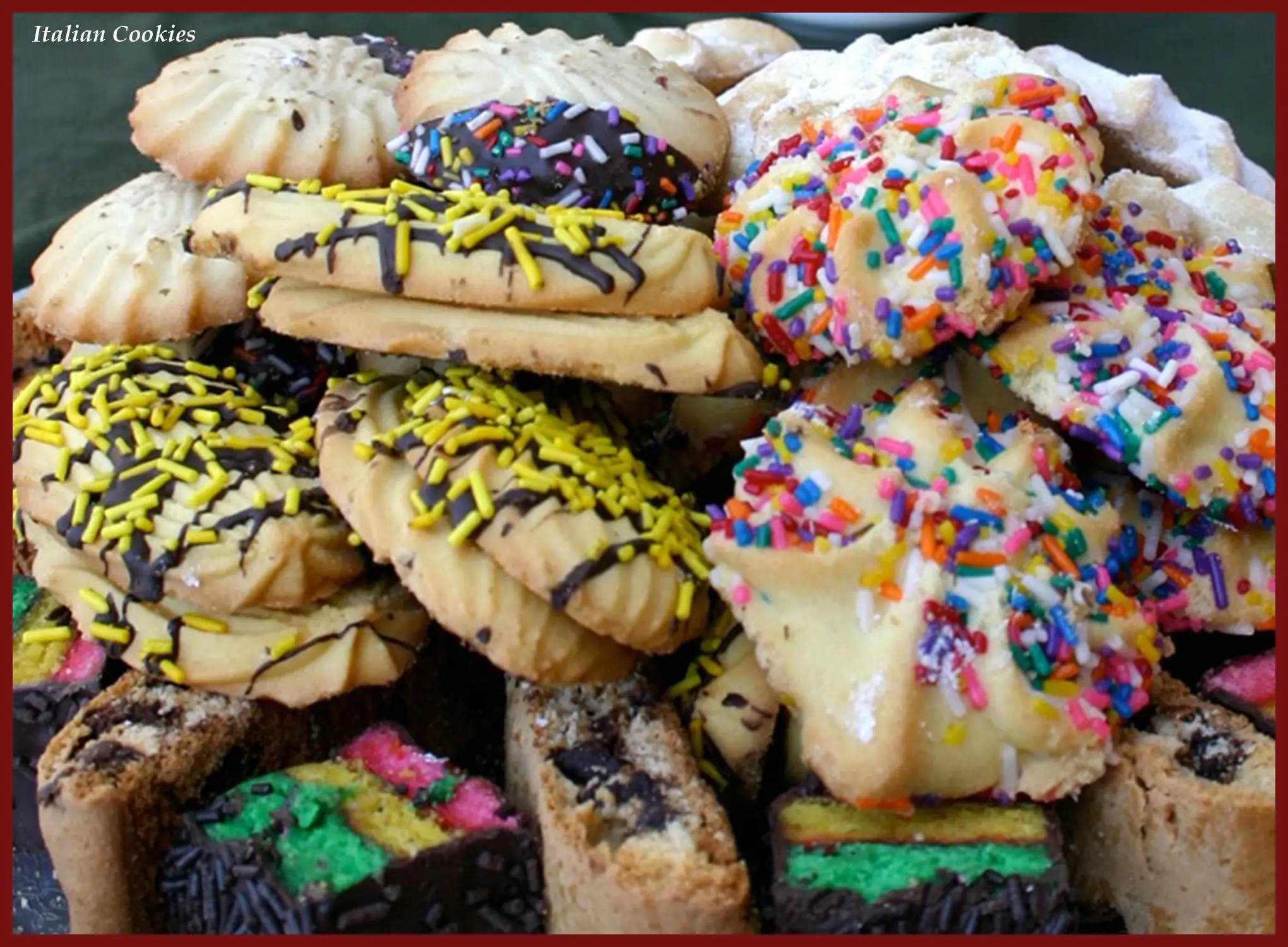 A pile of cookies with different colored sprinkles.