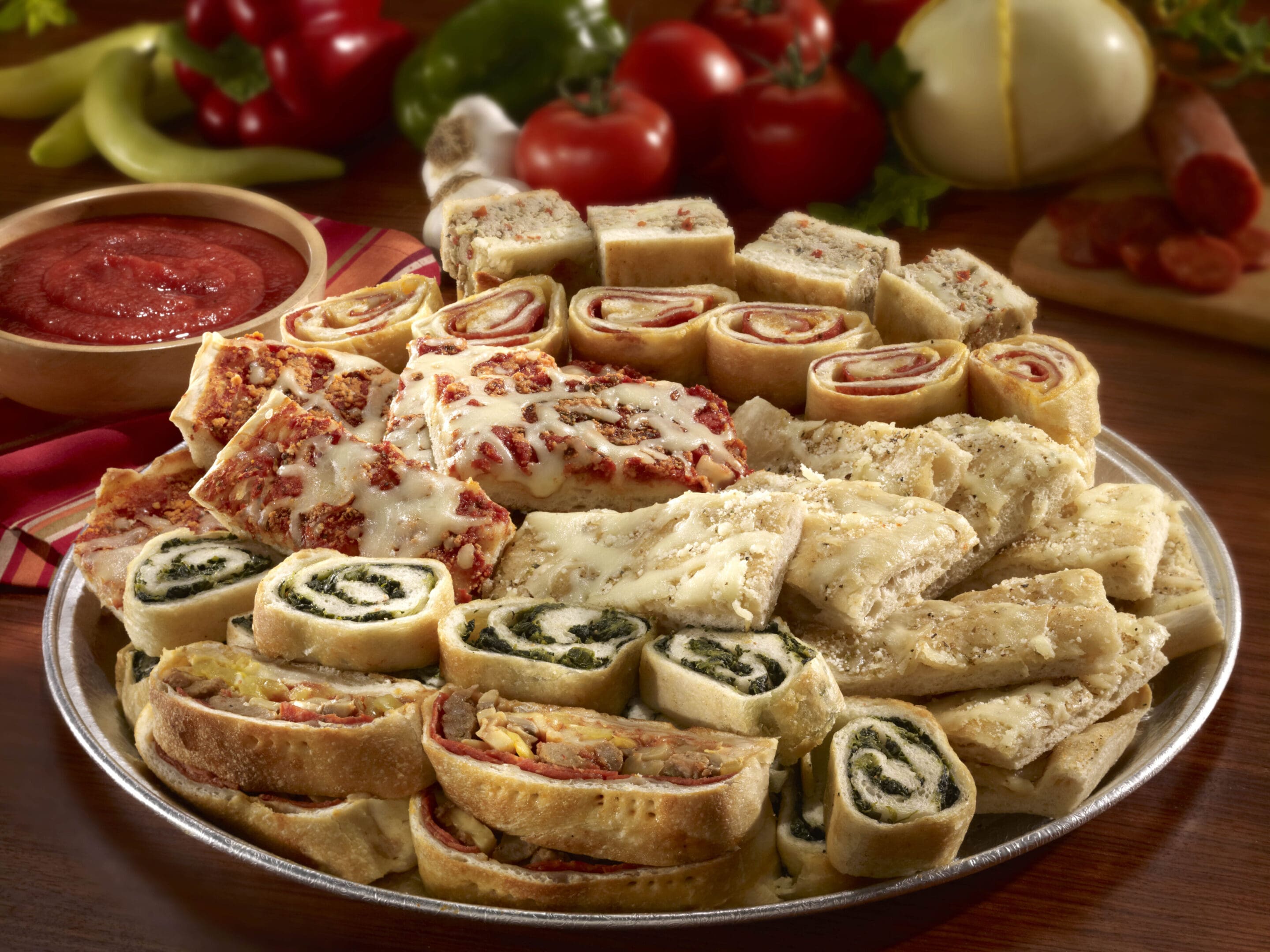 A platter of food with many different types.