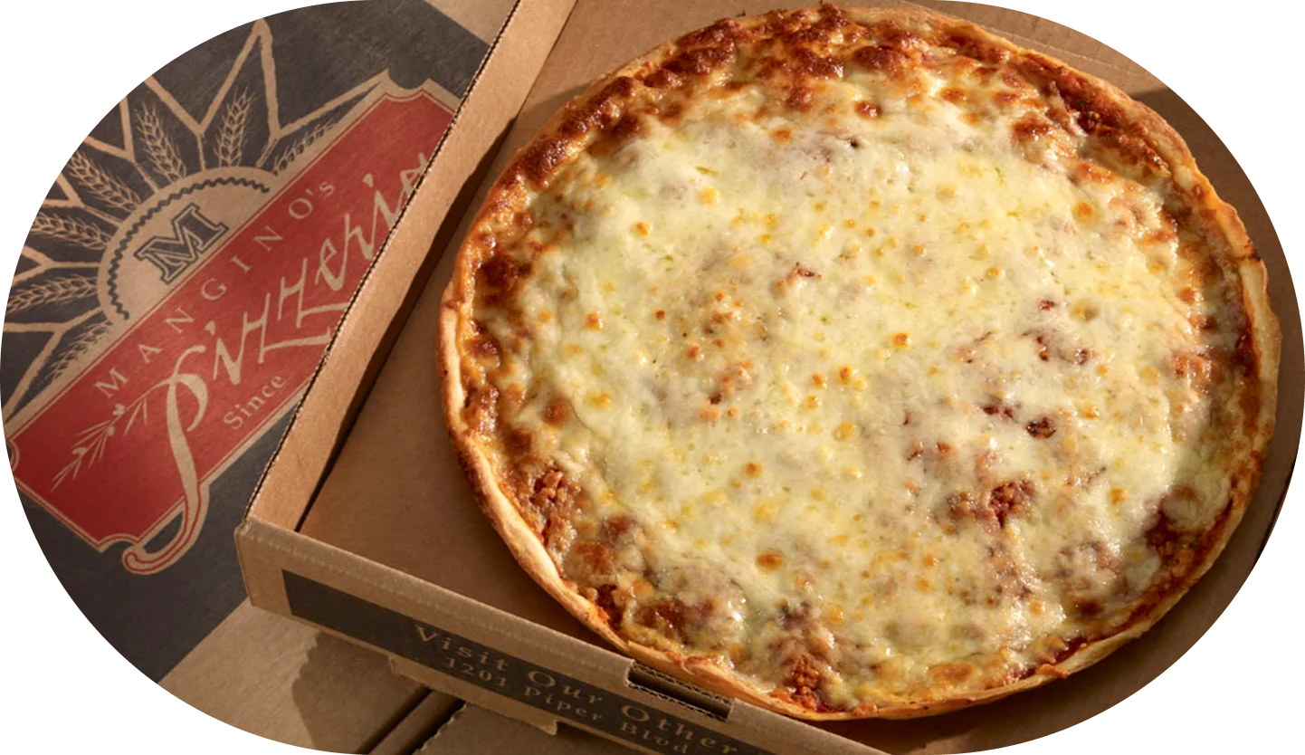 A pizza sitting in a box on top of the floor.