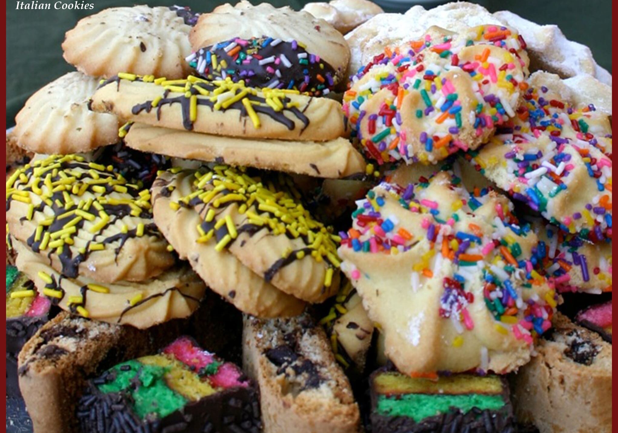 A pile of cookies with different colored sprinkles.